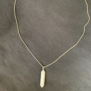 White oblong stone on silver chain necklace